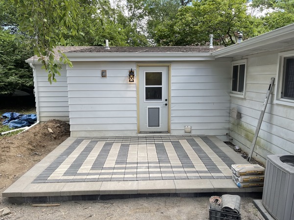 A tiled concrete patio.